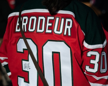 A fan with a signed Martin Brodeur jersey stands outside of the Adirondack Bank Center in Utica on Wednesday, April 6, 2022.

Martin Brodeur And Rob Esche