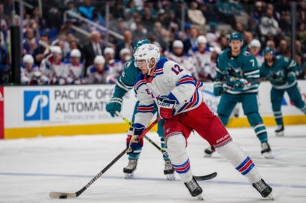 Nov 19, 2022; San Jose, California, USA; New York Rangers right wing Julien Gauthier (12) skates with the puck during the first period against the San Jose Sharks at SAP Center at San Jose. Mandatory Credit: Neville E. Guard-USA TODAY Sports
